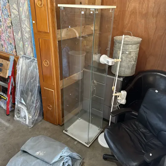 Glass display case with shelves