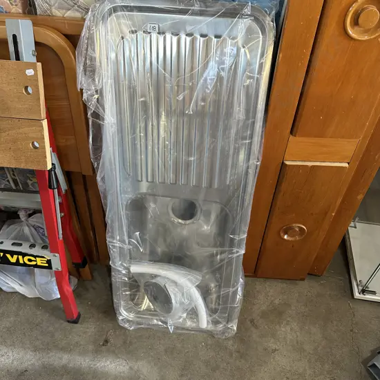 As new stainless sink and parts