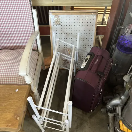 Peg boards and suitcase, shoe racks