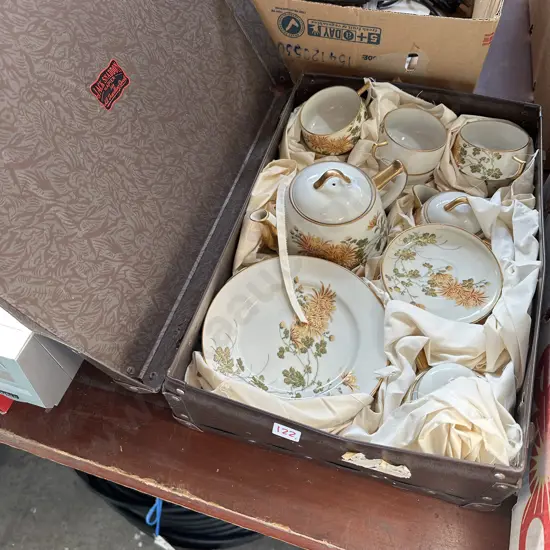 Vintage suitcase plus tea service