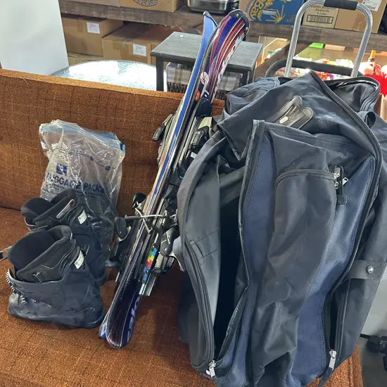 Trick skis, boots, bag plus gear