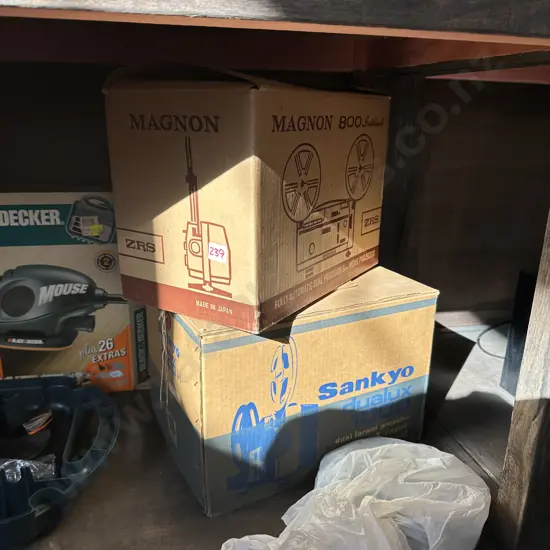 2 projectors plus a roll of carpet