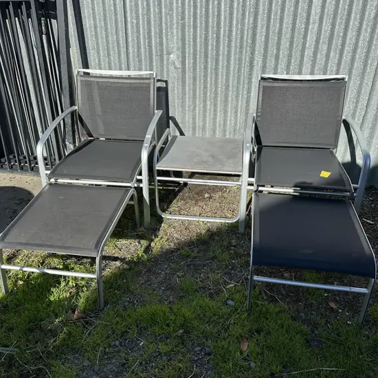Poolside loungers and side table