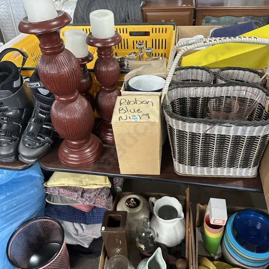 Candles, wicker basket, ski boots, bowls