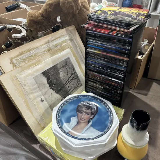 Vase, plate, paper, CDs, pictures