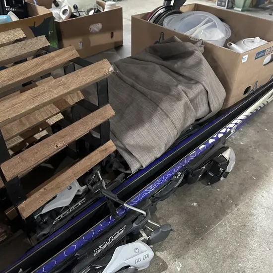 Drapes, wine rack, skis and box lot