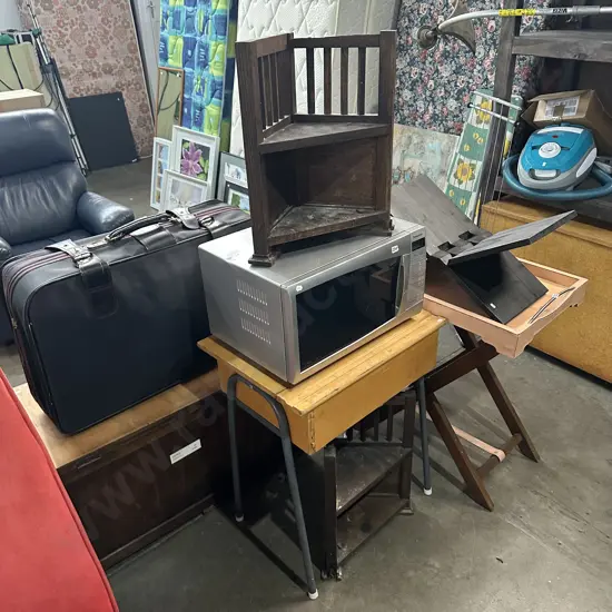 Desk, microwave, wooden shelves