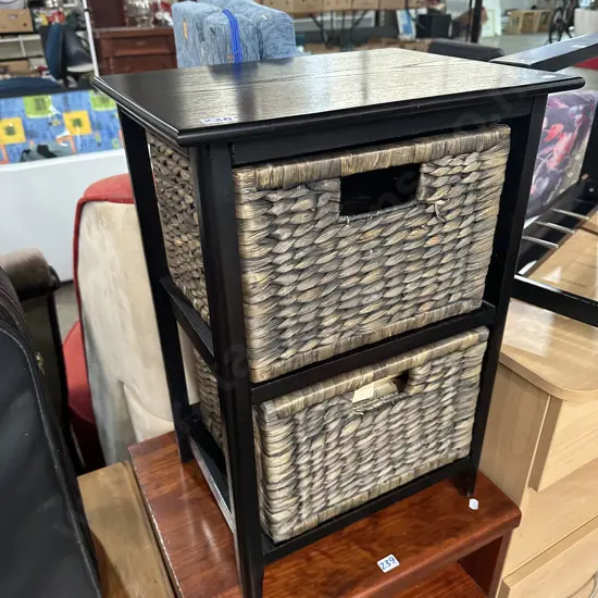 Wicker basket side table and contents