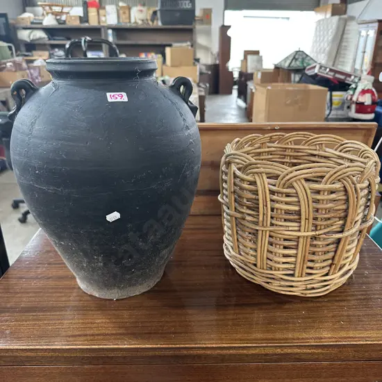 Terracotta pot and wicker basket