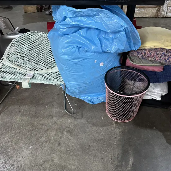 Baby bouncer, paper baskets, cushions, bag of bedding