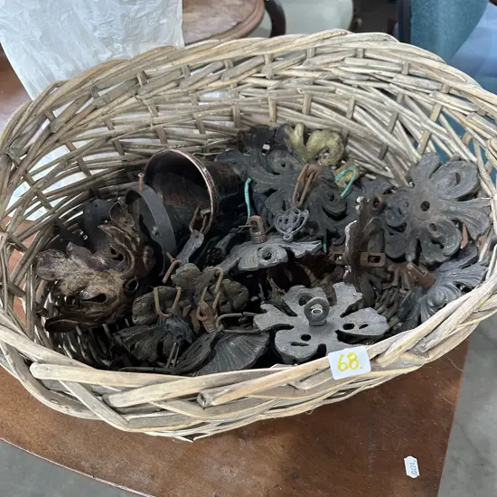 basket of cast light fittings and chain