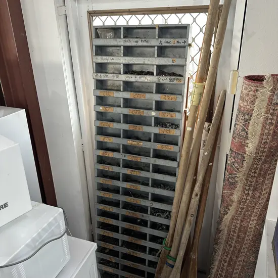 Wall shelf for nuts and bolts