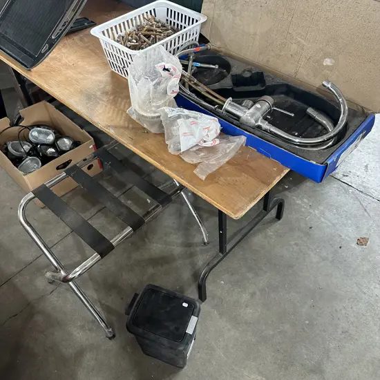 Taps and hardware, suitcase stand and bin