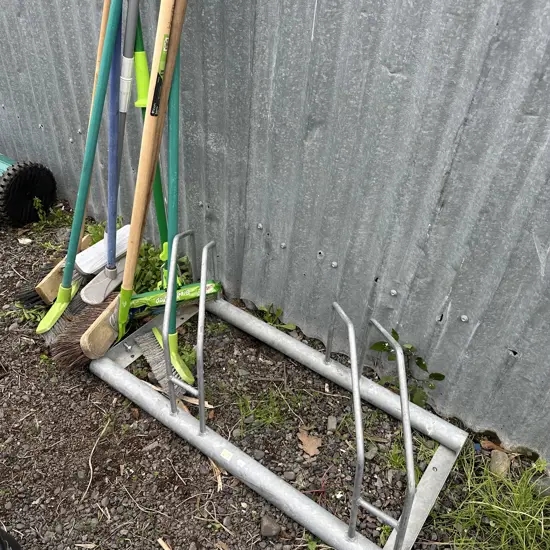 bike stand and brooms