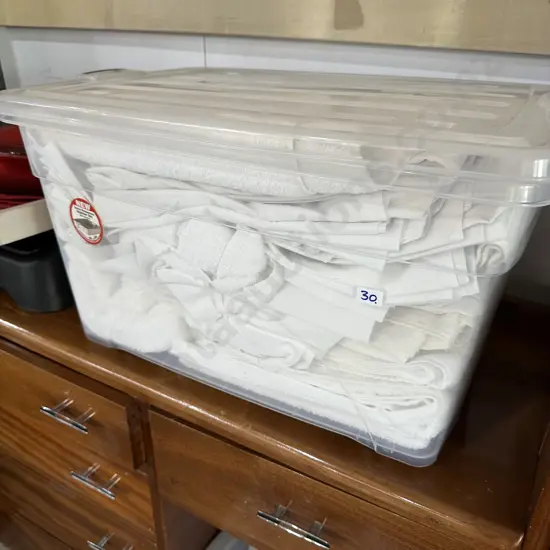 Bin of towels and sheets