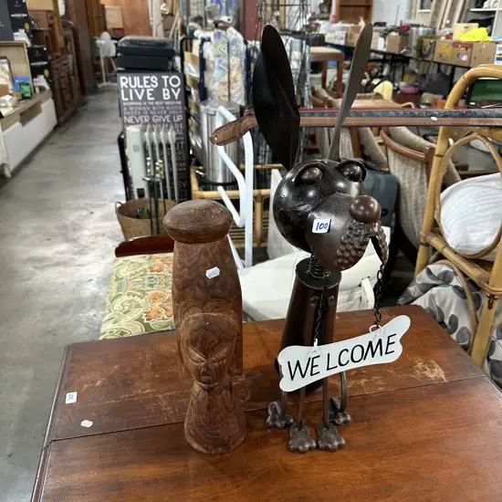 Welcome sign and carving