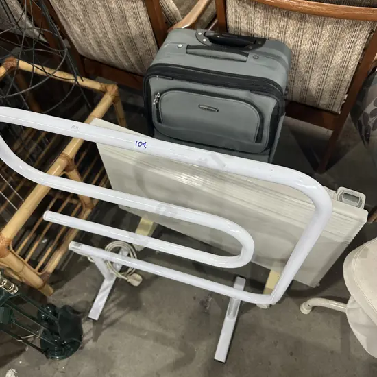 Towel stand, heater and suitcase