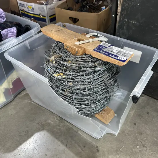 Roll of unused barbed wire
