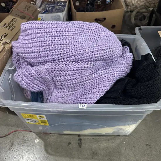 Bin of woolen and other clothes