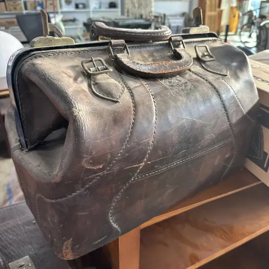 Early leather travel bag with oriental makers stamp
