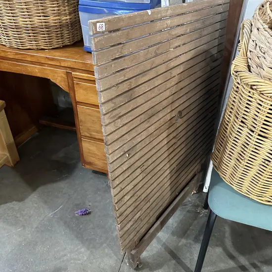 Folding outdoor table and average cloths horse