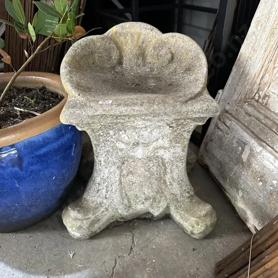 Small concrete garden seat