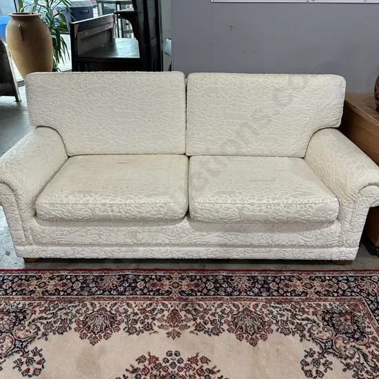 Sofa by Wilson & Nicholson of Auckland,  Andrew Martin fabric depicting jungle animals