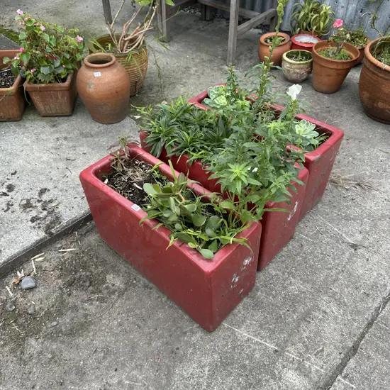 3 red planters