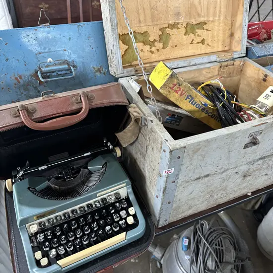 Wooden box, contents and typewritter