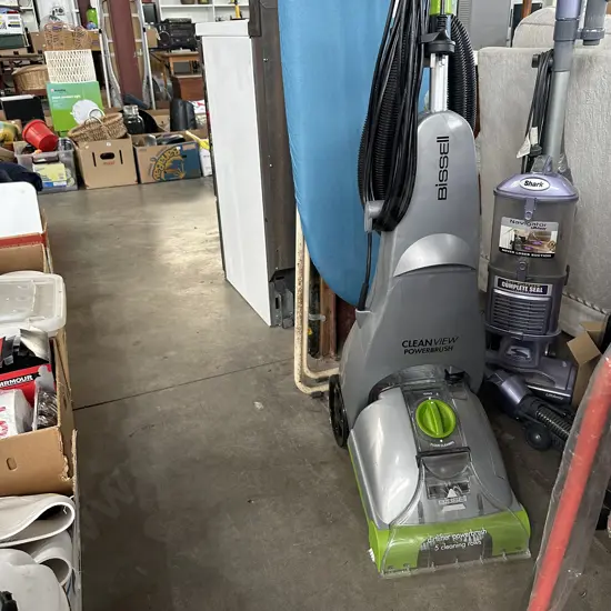 Bissell plus a mop and iron board