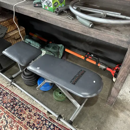 Bench press, bar,weights and ab circle pro.