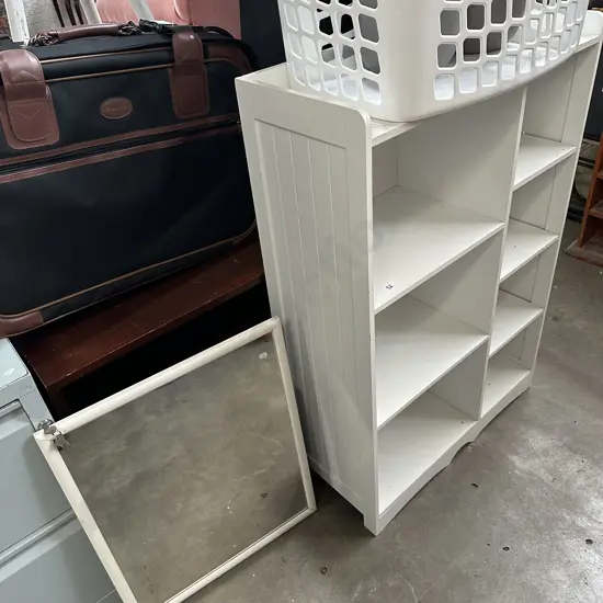 Bookshelf, mirror and suitacses