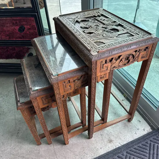 Carved Camphor wood nest of 4 tables