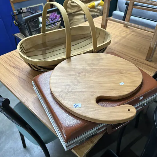 basket, cheese board and suitcase