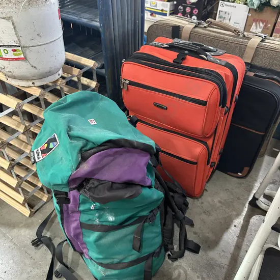 3 suitcases,pack and contents