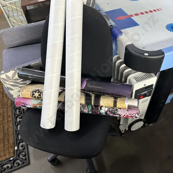 heater, office chair and posters