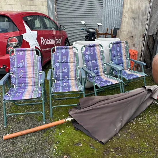 4 deck chairs and umbella