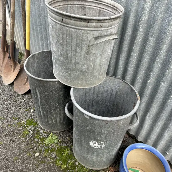 3 trash can planters