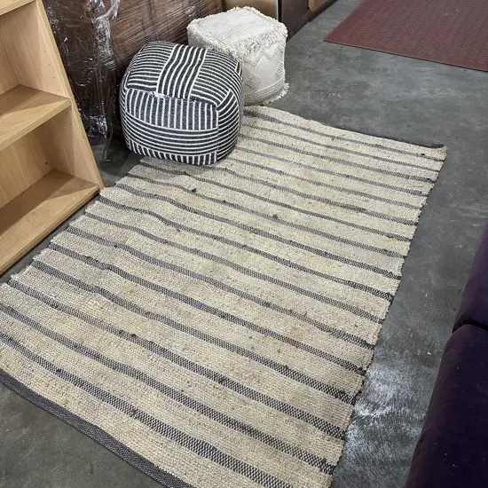 2 foot poofs(1 requires small stitch) and rug