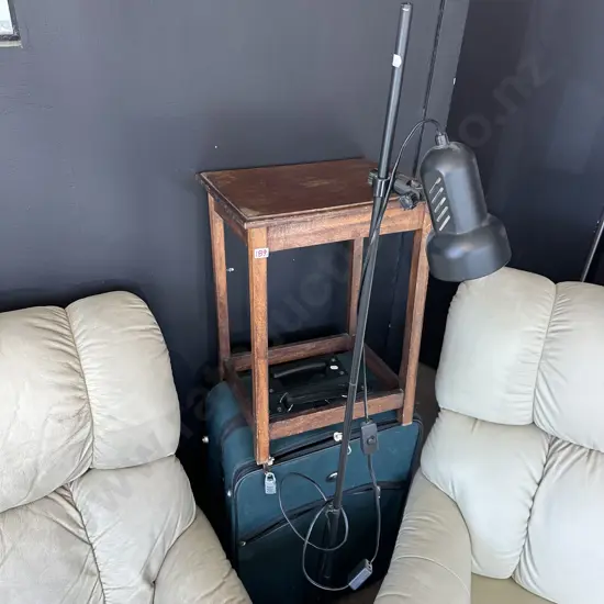 suitcase, lamp and sidetable