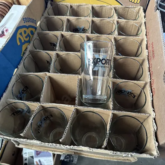Two dozen eXport beer glasses