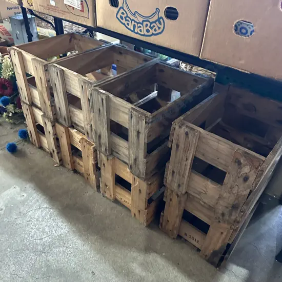 8 empty beer crates