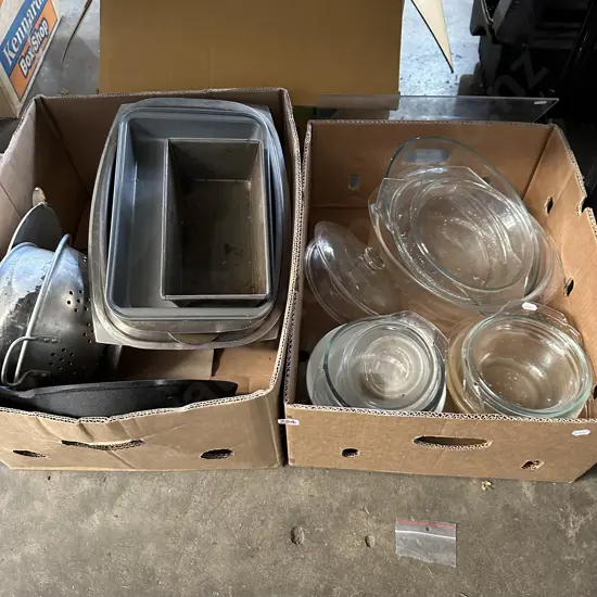Two boxes kitchenware including cast iron pan