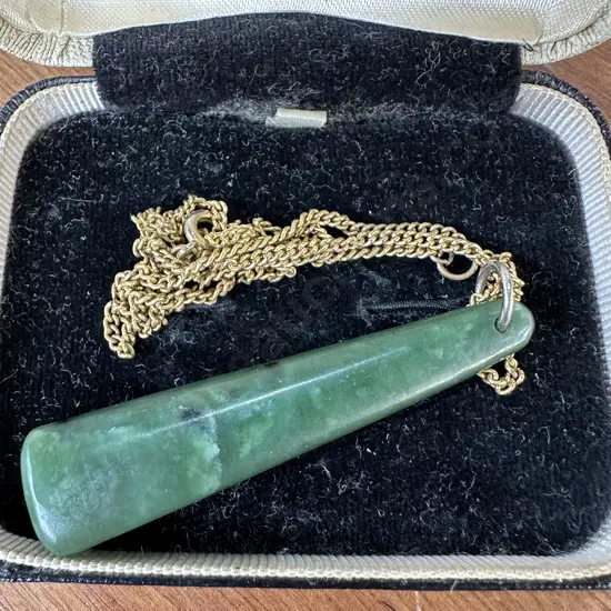 Jade pendant 63mm in length, on chain