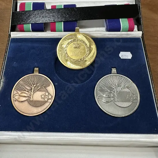 Presentation set of medals from 1990 NZ games