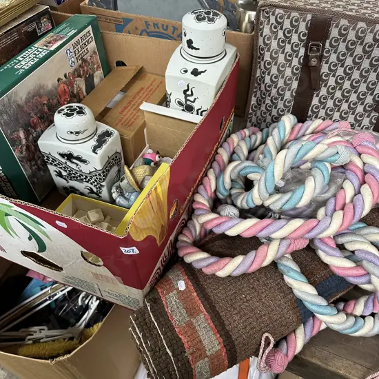 Box,curtain ties,rug.