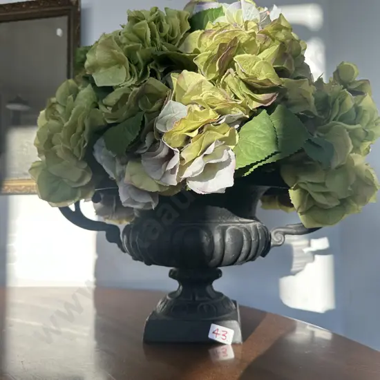 cast double handle urn with flowers