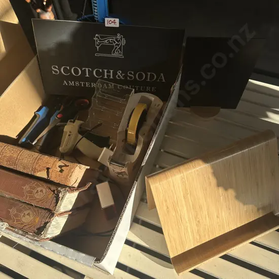 office items and metal sign, books