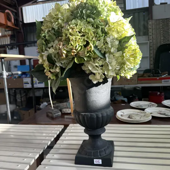 large cast planter and flowers