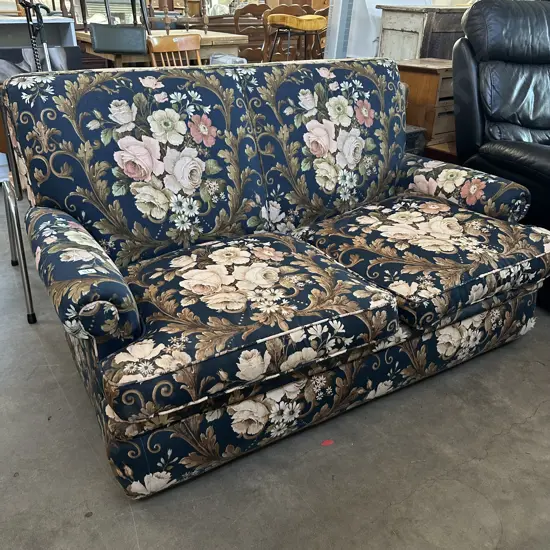 vintage sofa with spare material ( torn on the bottom corner)